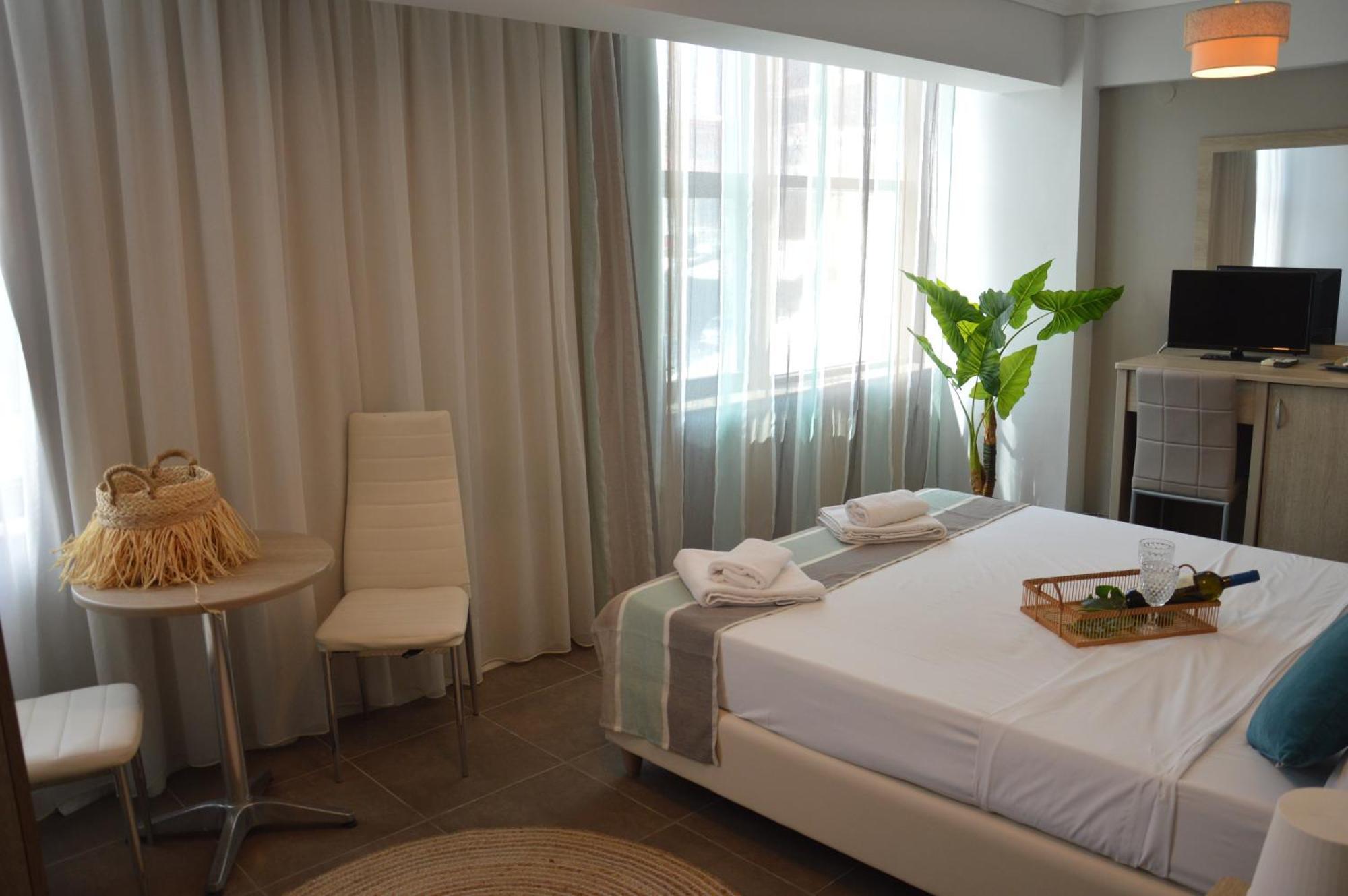 Aqua Mare Sea Side Rooms Nea Kallikrateia Exterior foto